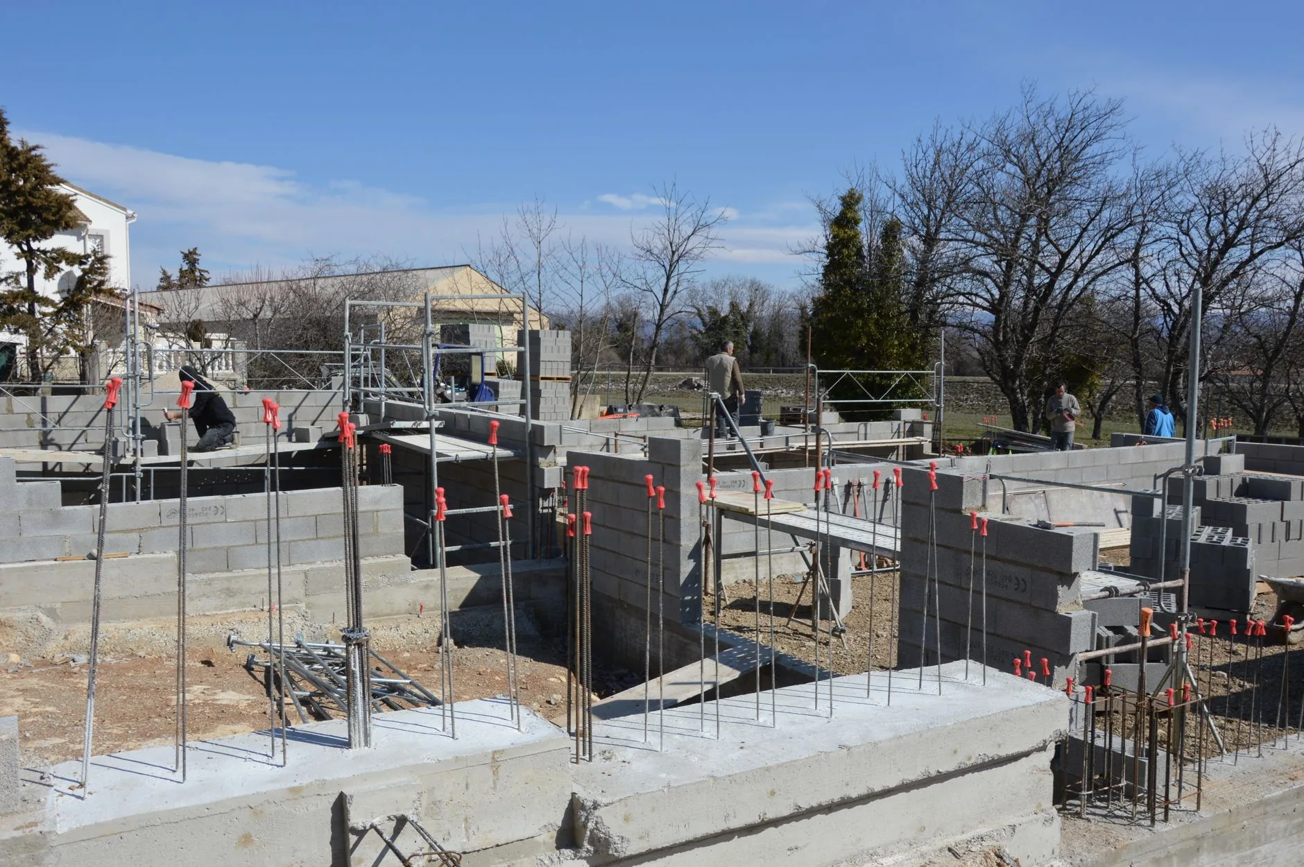 Concrete and block foundation walls under construction for a house